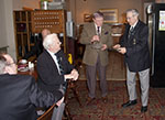 Derek presents Fred Patman with a decanter for 18 years as Chairman